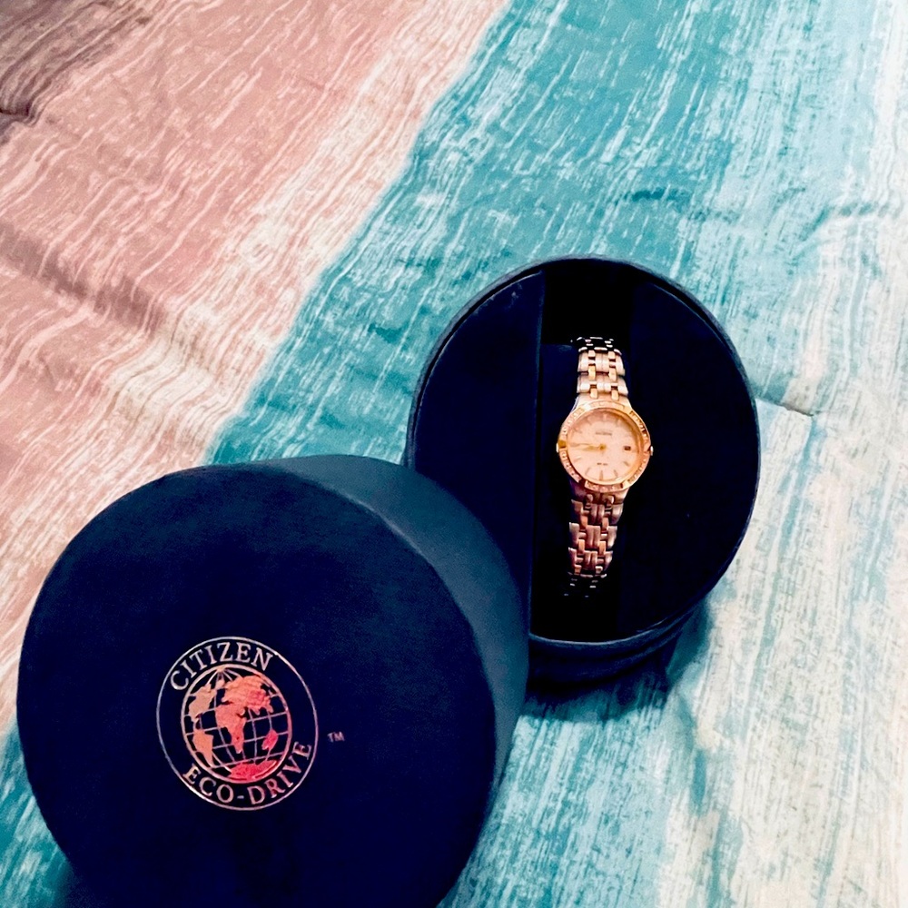 Woman’s CITIZEN ECO DRIVE diamond bezel watch